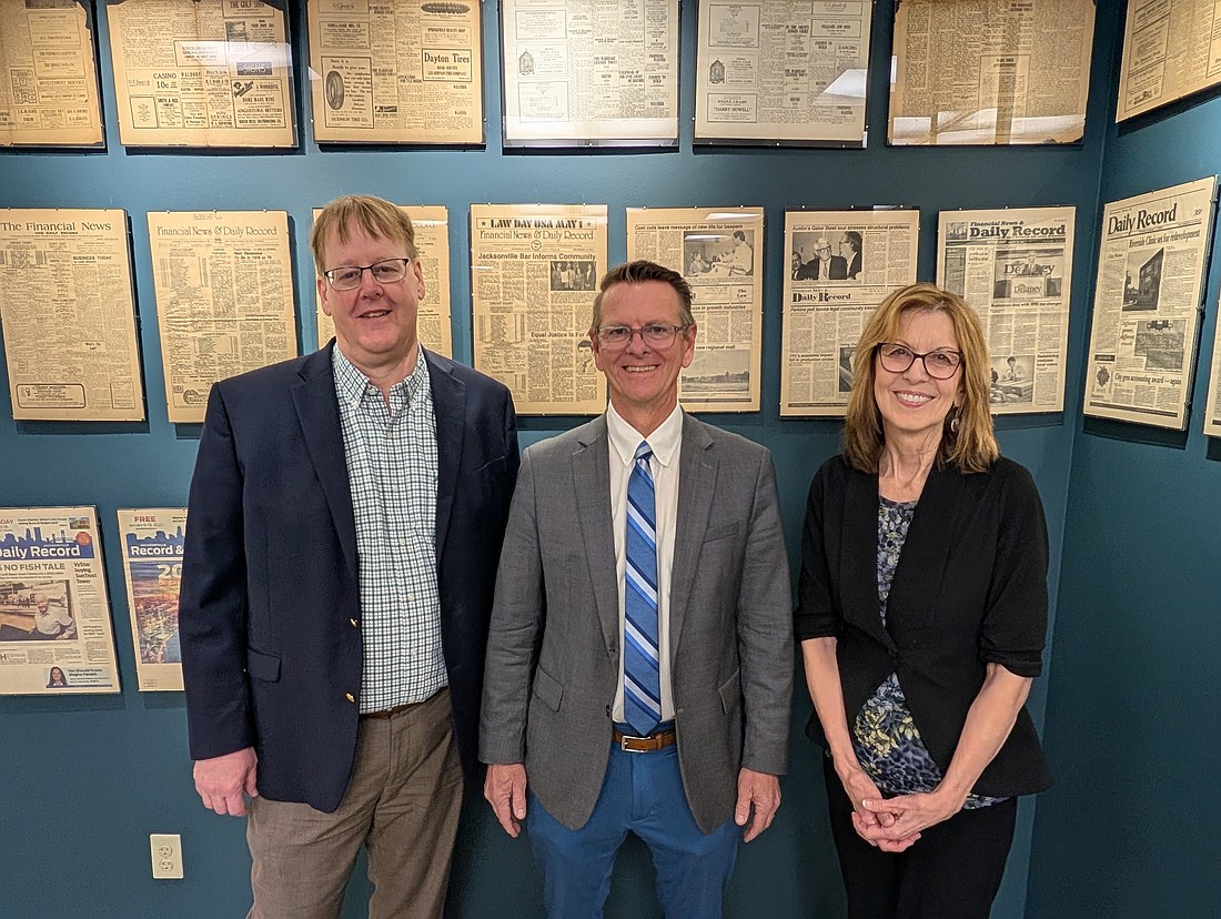From left are Monty Zickuhr, outgoing editor; Ric Anderson, incoming editor; and Karen Mathis, editor at large.