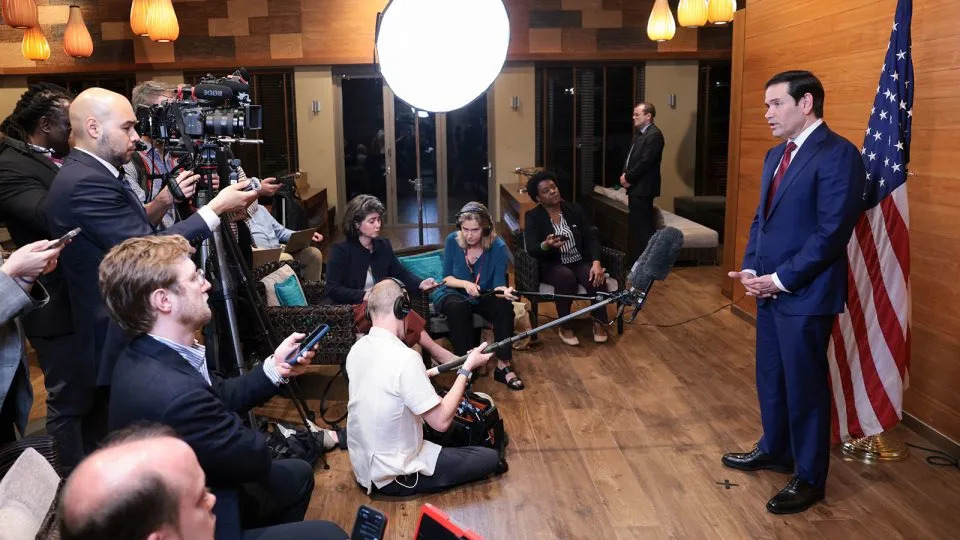 US Secretary of State Marco Rubio speaks to reporters in a departure lounge before returning to Washington following meetings with Caribbean Community leaders, at Robert L. Bradshaw International Airport in Basseterre, Saint Kitts and Nevis, on February 25. - Jonathan Ernst/Pool/AFP/Getty Images