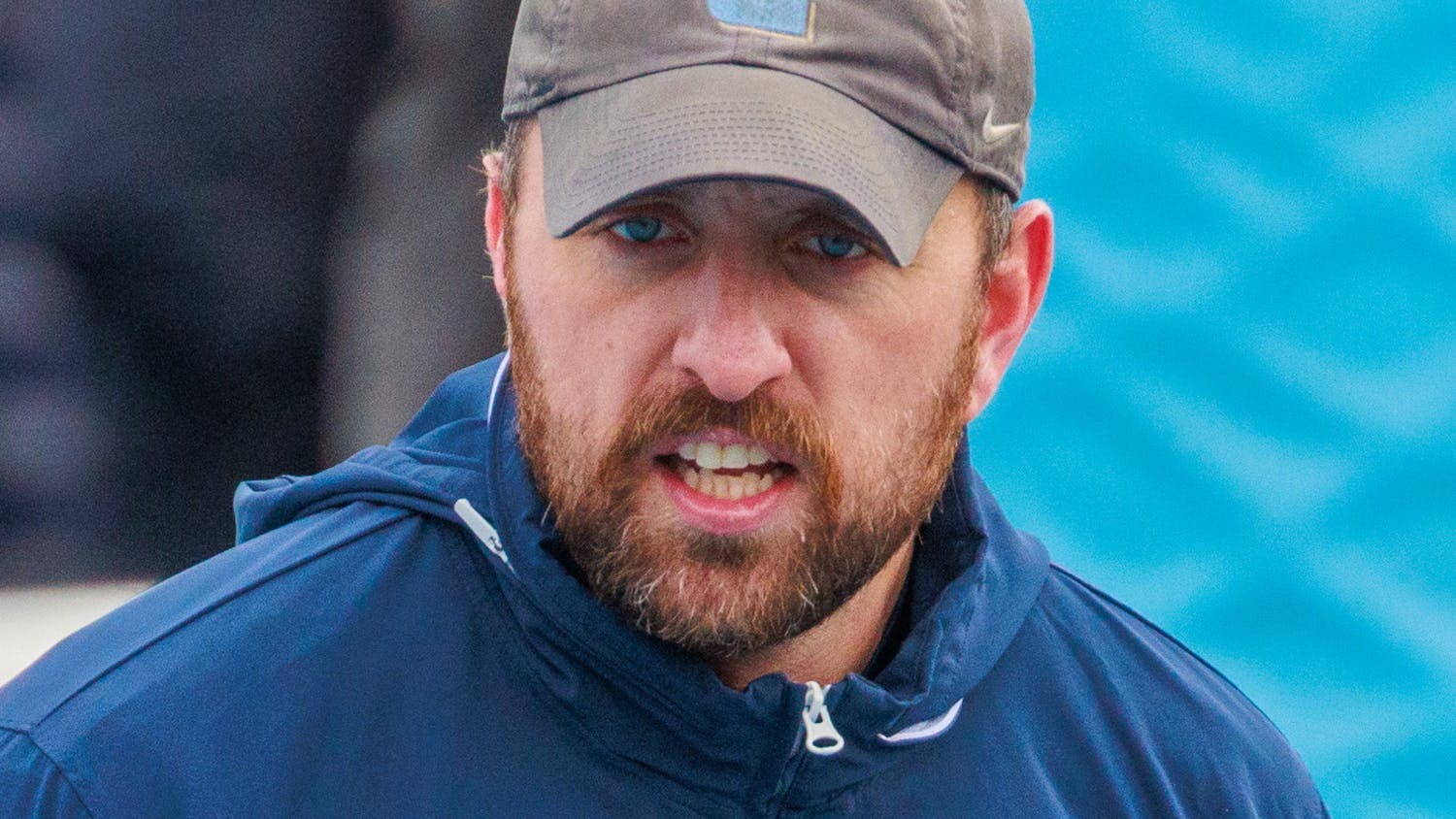 Garrett McLaughlin as Columbia defensive line coach and special teams coordinator. 