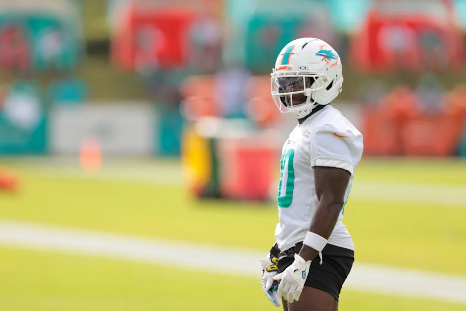 Miami Dolphins wide receiver Tyreek Hill (10) looks on during training camp at Baptist Health Training Complex.Sam Navarro-Imagn Images