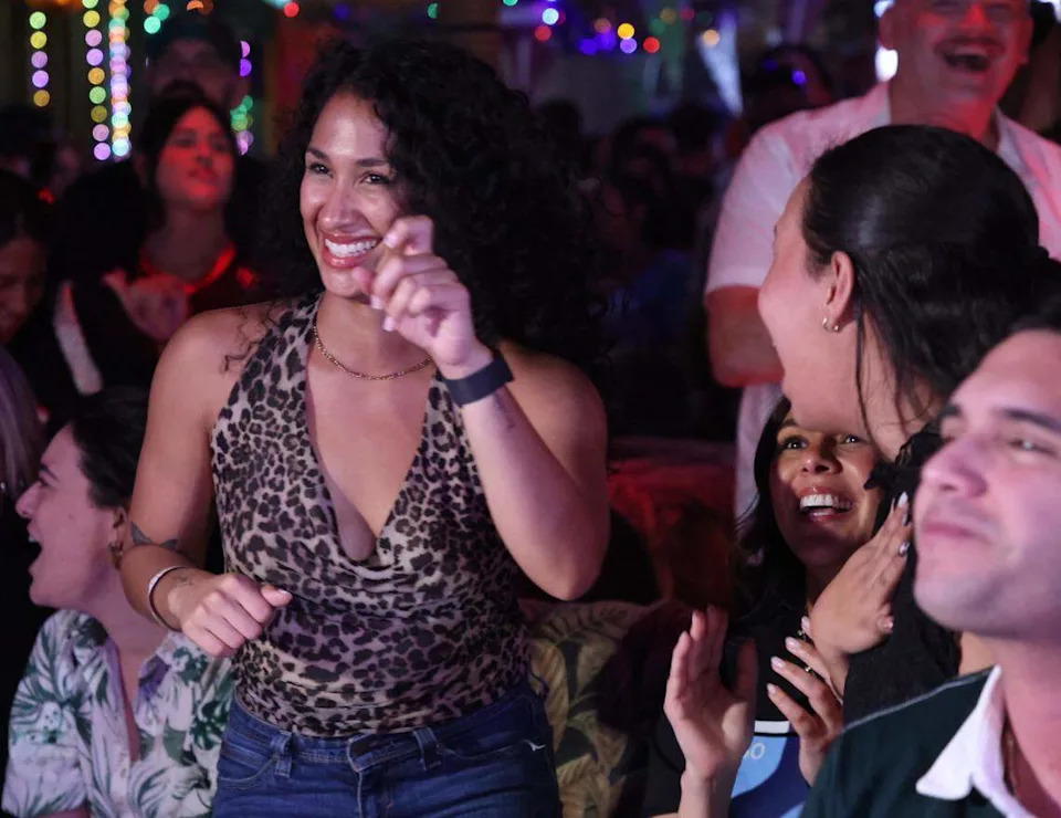 The crowd dance and sings to Bad Bunny music between commercial breaks of the Super Bow. 