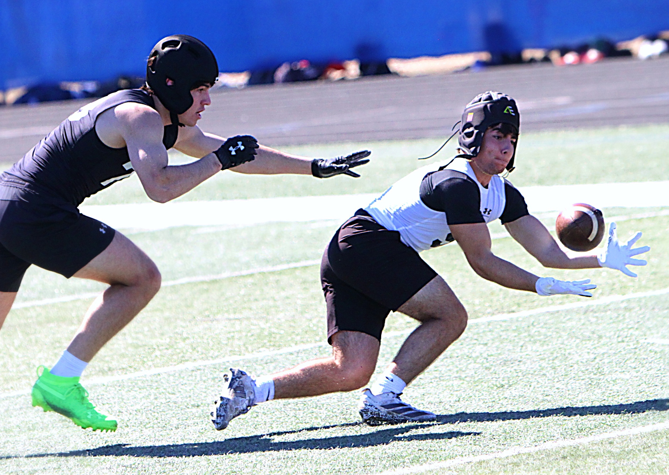 Blaze Allen of Bishop Moore defends Felix Manuyari of Jacksonville...