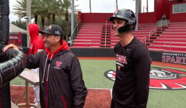 University of Tampa head baseball coach Joe Urso and second baseman Brayden Woodburn look on at batting practice. (Spectrum Sports 360/Michael Epps)