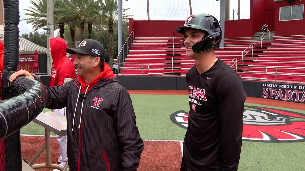 University of Tampa head baseball coach Joe Urso and second baseman Brayden Woodburn look on at batting practice. (Spectrum Sports 360/Michael Epps)