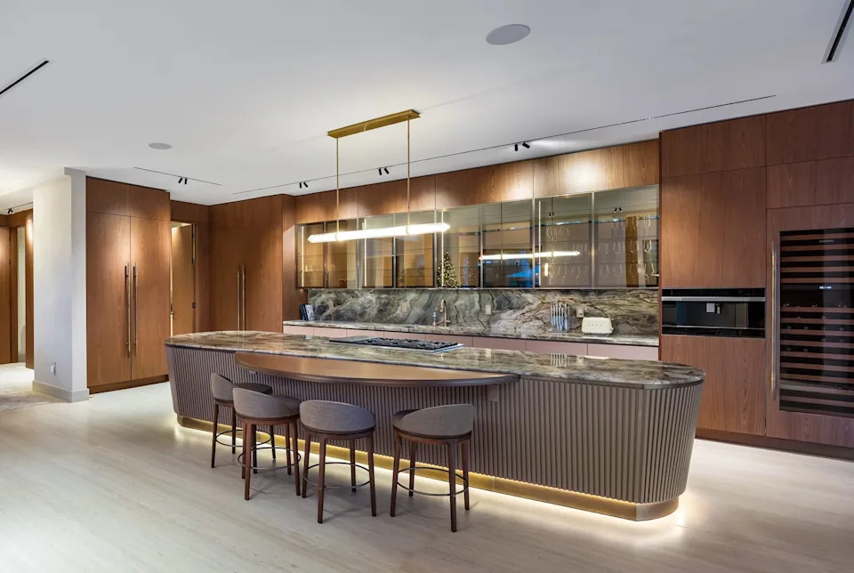 In addition to the main kitchen, there is also a chef's kitchen that is accessed through a hidden door.