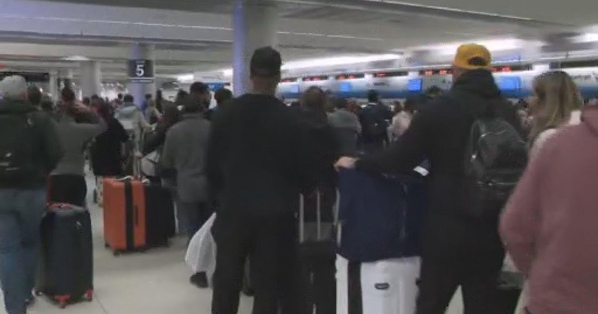 Cold weather brings chaos, delays and cancellations to travelers at South Florida airports: "It's a big mess"