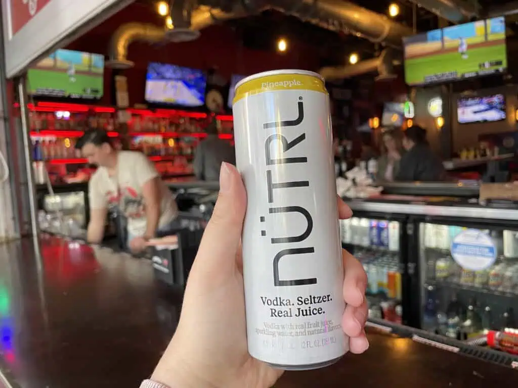 A can of seltzer at a bar