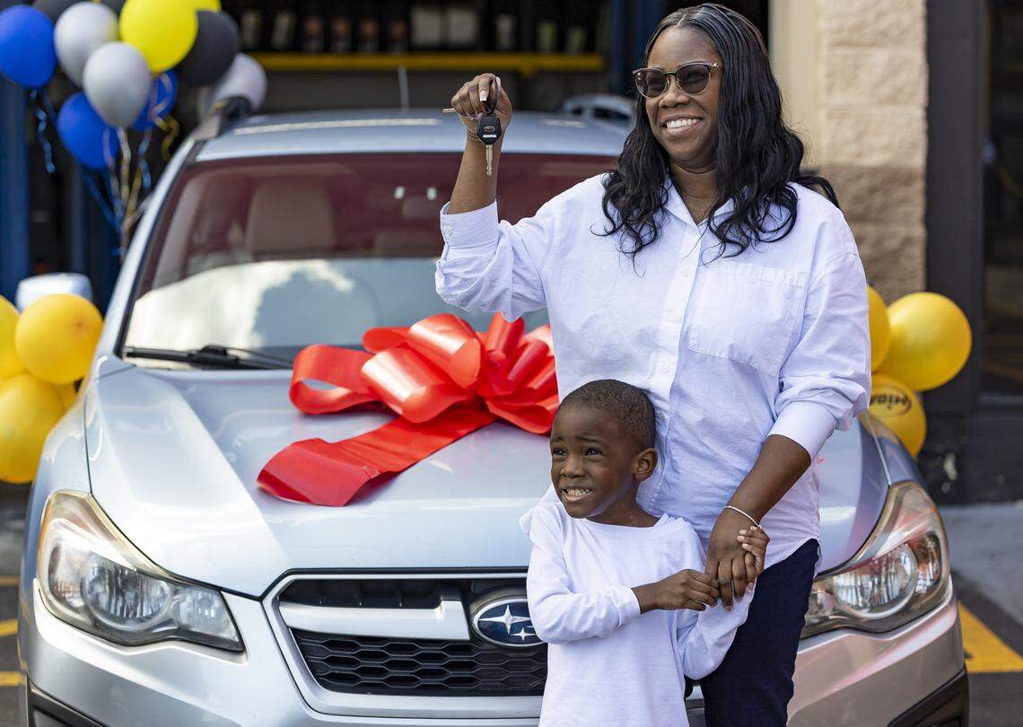 Kingston Allen, 4, and his mom, Renee King, 36, were gifted a refurbished Subaru Impreza at a Midas in Fort Lauderdale. 