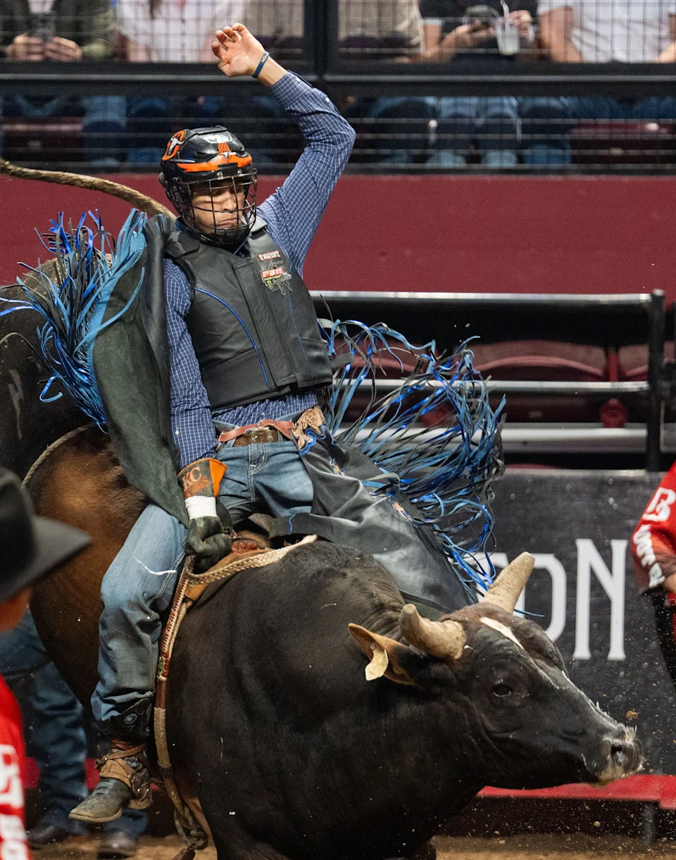 Riders compete in the Professional Bull Riders (PBR) Tallahassee competition held in the Donald L. Tucker Civic Center on Friday, March 14, 2025.