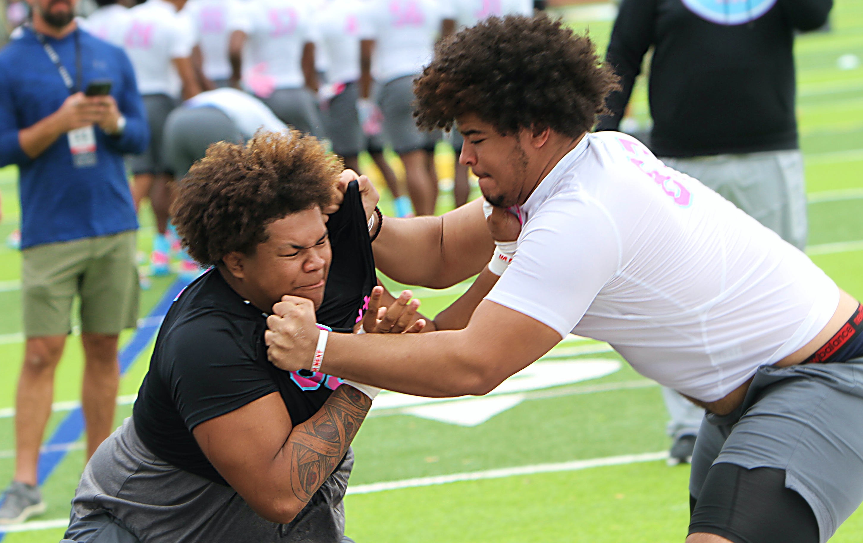 Lake Nona 2028 defensive lineman Darren White-Jackson (left) at the...