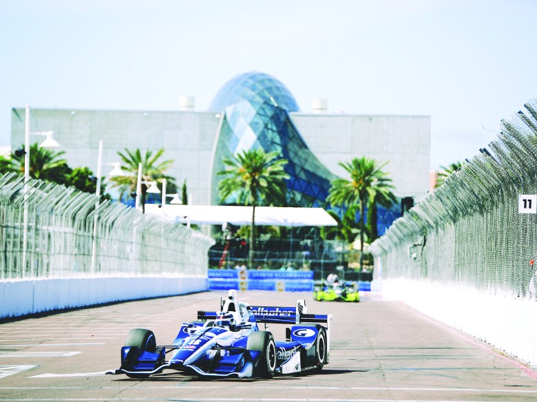 IndyCar racing past the Dalí Museum during the Firestone Grand Prix of St. Petersburg street circuit event.