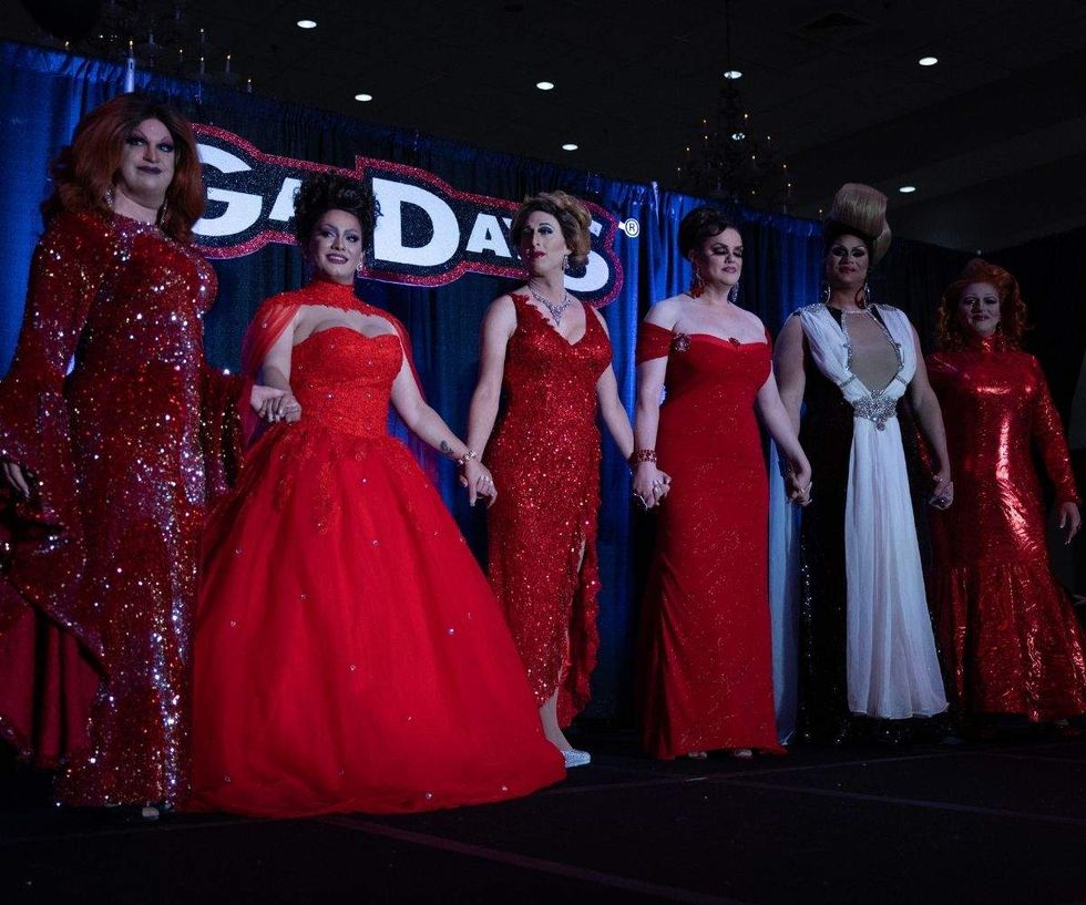 drag queen onstage at a gay days event