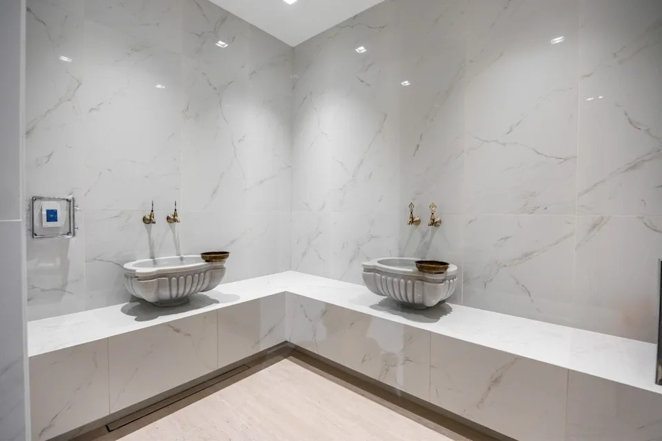 Logan's sanctuary is equipped with a Turkish-inspired steam room, known as a hammam.