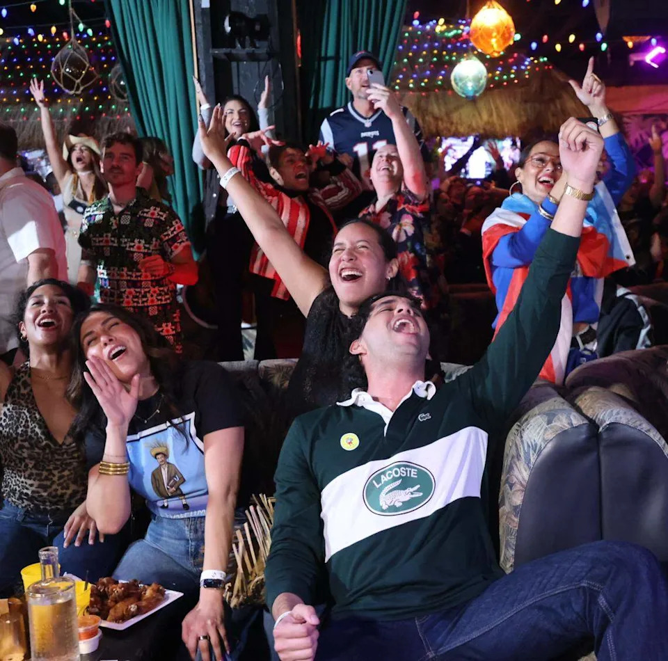The crowd dances and sings to Bad Bunny music between commercial breaks of the Super Bowl.
