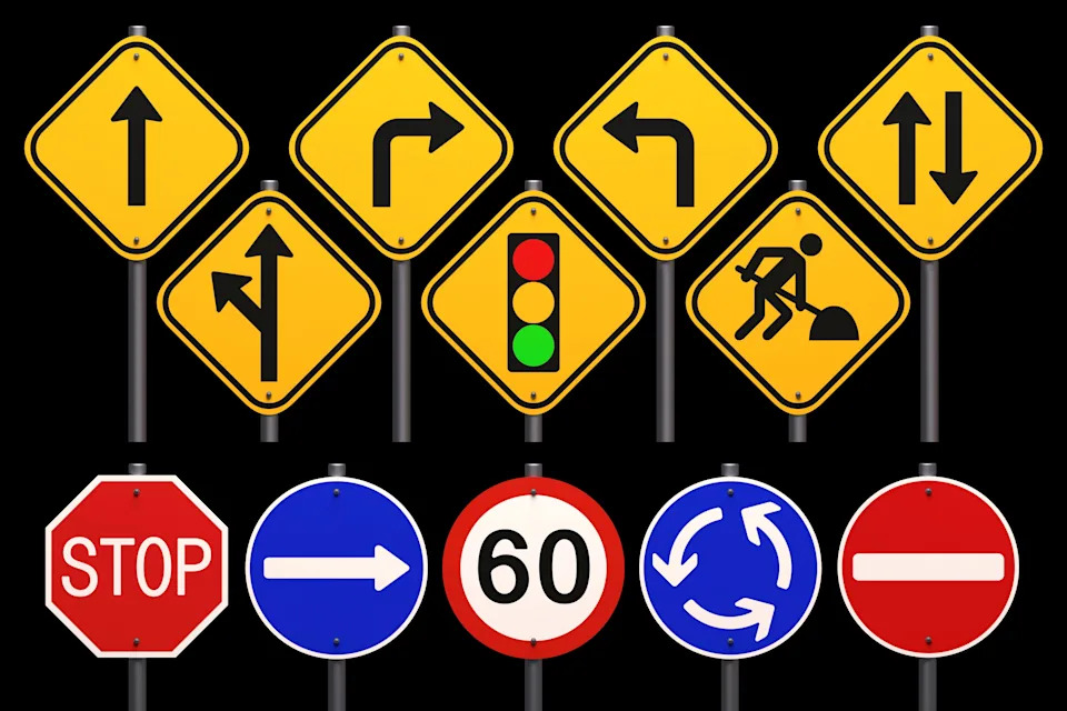 Various road signs, including directional arrows, stop, speed limit, traffic lights, construction, and a no-entry sign, are displayed