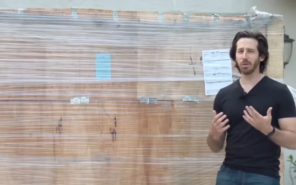 Miami man gets randomly sent a massive crate from China with a micro car inside and is left in disbelief when he unboxes it