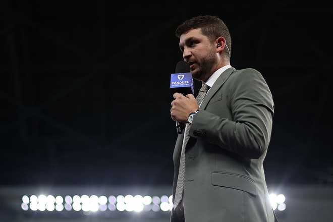 MIAMI, FLORIDA - JULY 1:  Reporter for FanDuel Sports Network, Jeremy Tache prior to the game between the Miami Marlins and the Minnesota Twins at loanDepot park on July 1, 2025 in Miami, Florida. (Photo by Leonardo Fernandez/Getty Images)