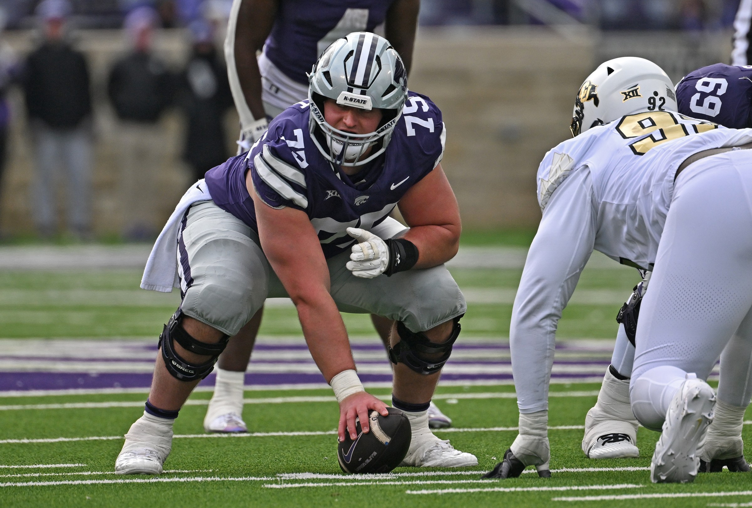 MANHATTAN, KS - NOVEMBER 29: Center Sam Hecht #75 of the Kansas State Wildcats gets set on the line of scrimmage against the Colorado Buffaloes in the second half at Bill Snyder Family Football Stadium on November 29, 2025 in Manhattan, Kansas. (Photo by Peter G. Aiken/Getty Images)