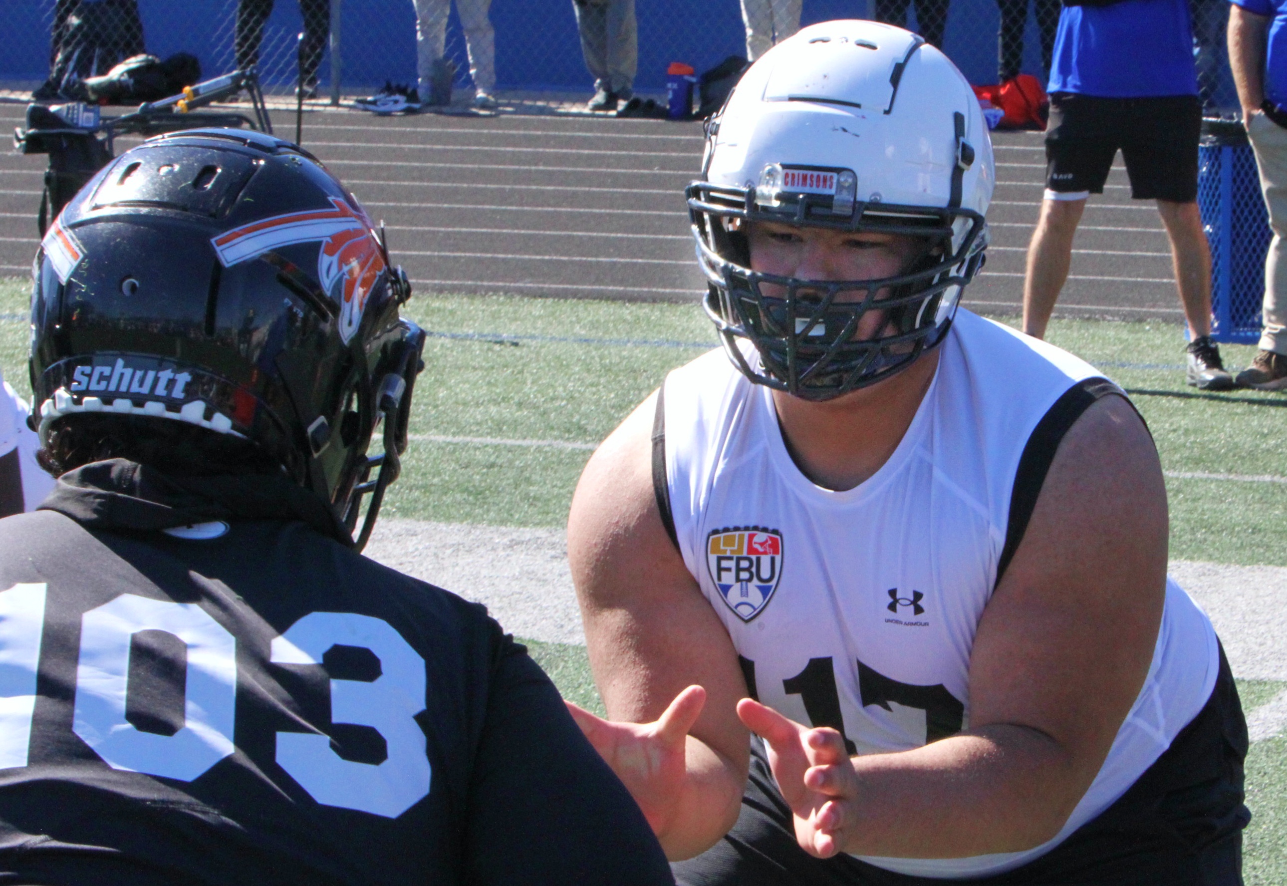 Herlan Leyva Ramirez of Louisville, Ky., battles Amarii Sims of...