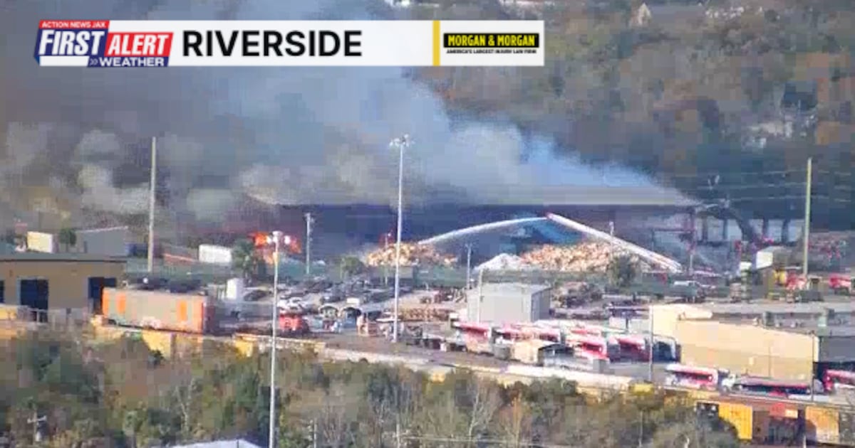 Jacksonville firefighters spraying water on flames at Westside recycling plant – Action News Jax