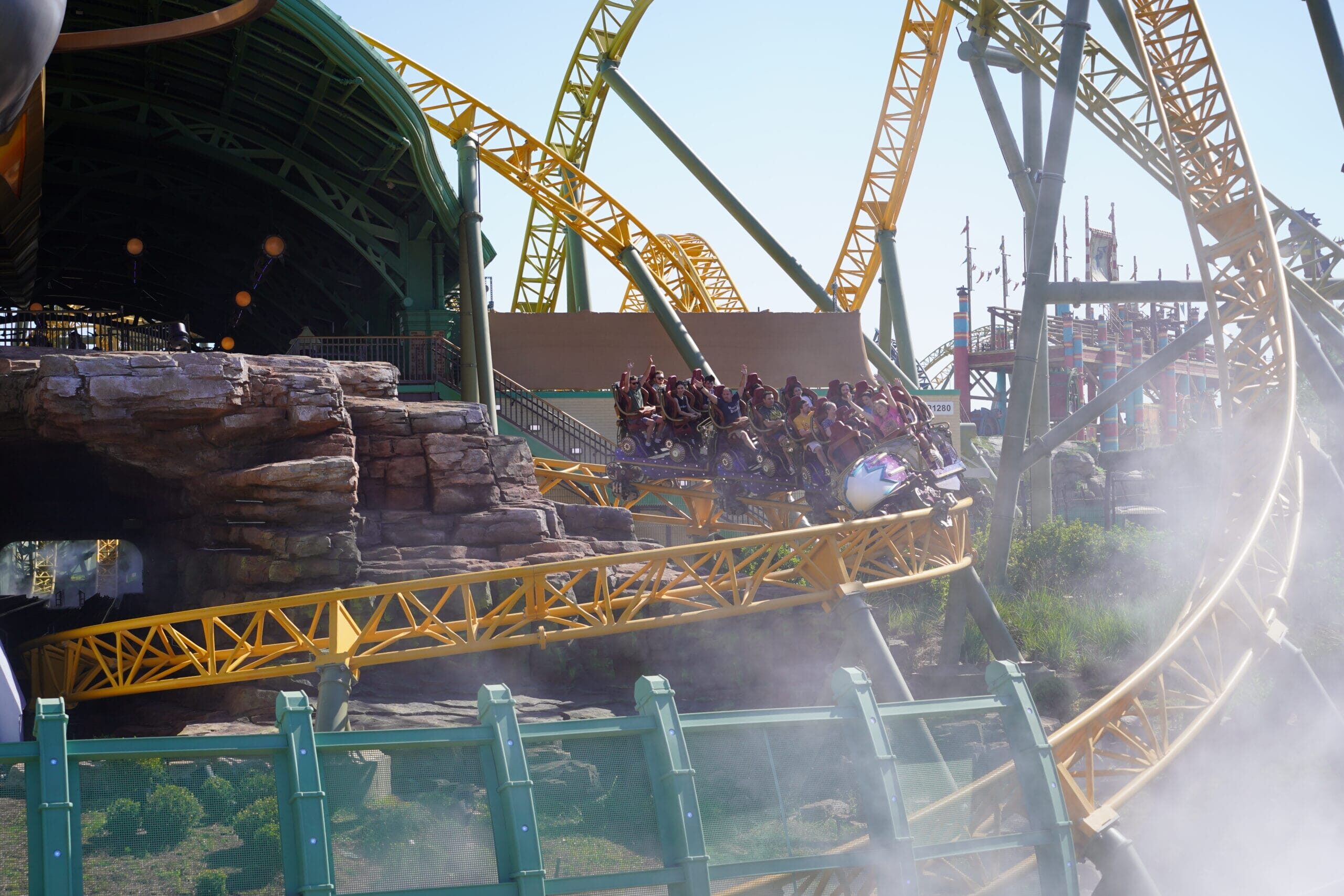 Trains approach the initial launch on the Stardust Racers dueling roller coaster in Epic Universe