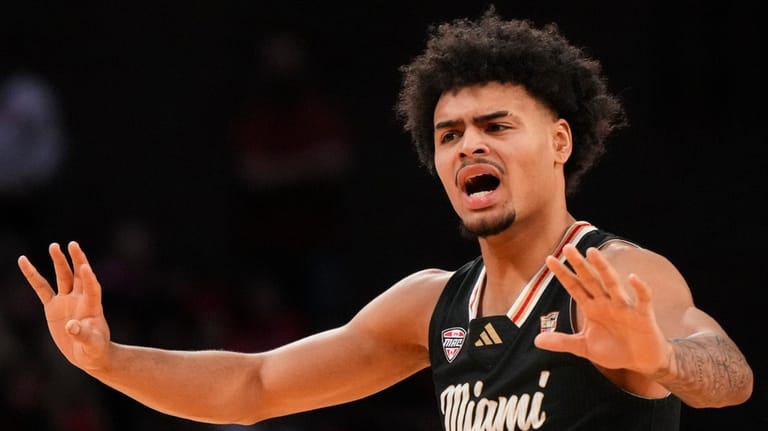 Miami (Ohio) guard Trey Perry reacts during the first half...