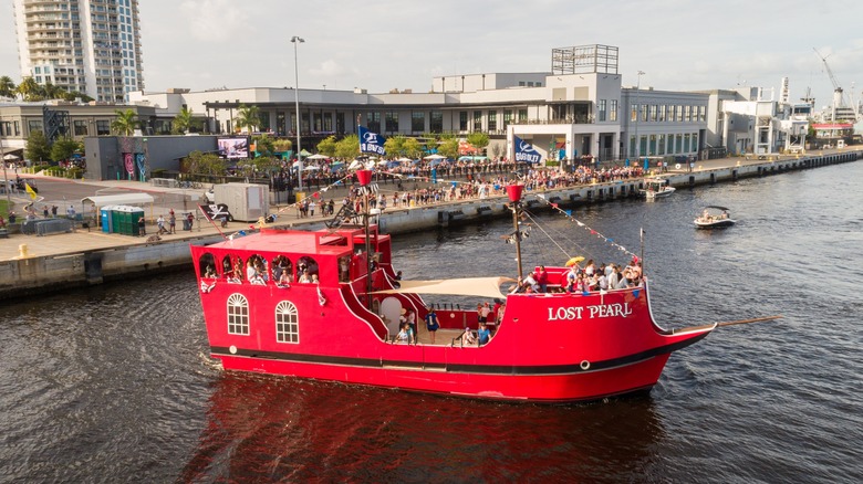A red pirate ship sails on the river in Tampa, Florida.