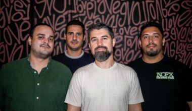 Photo of a band posing for the camera