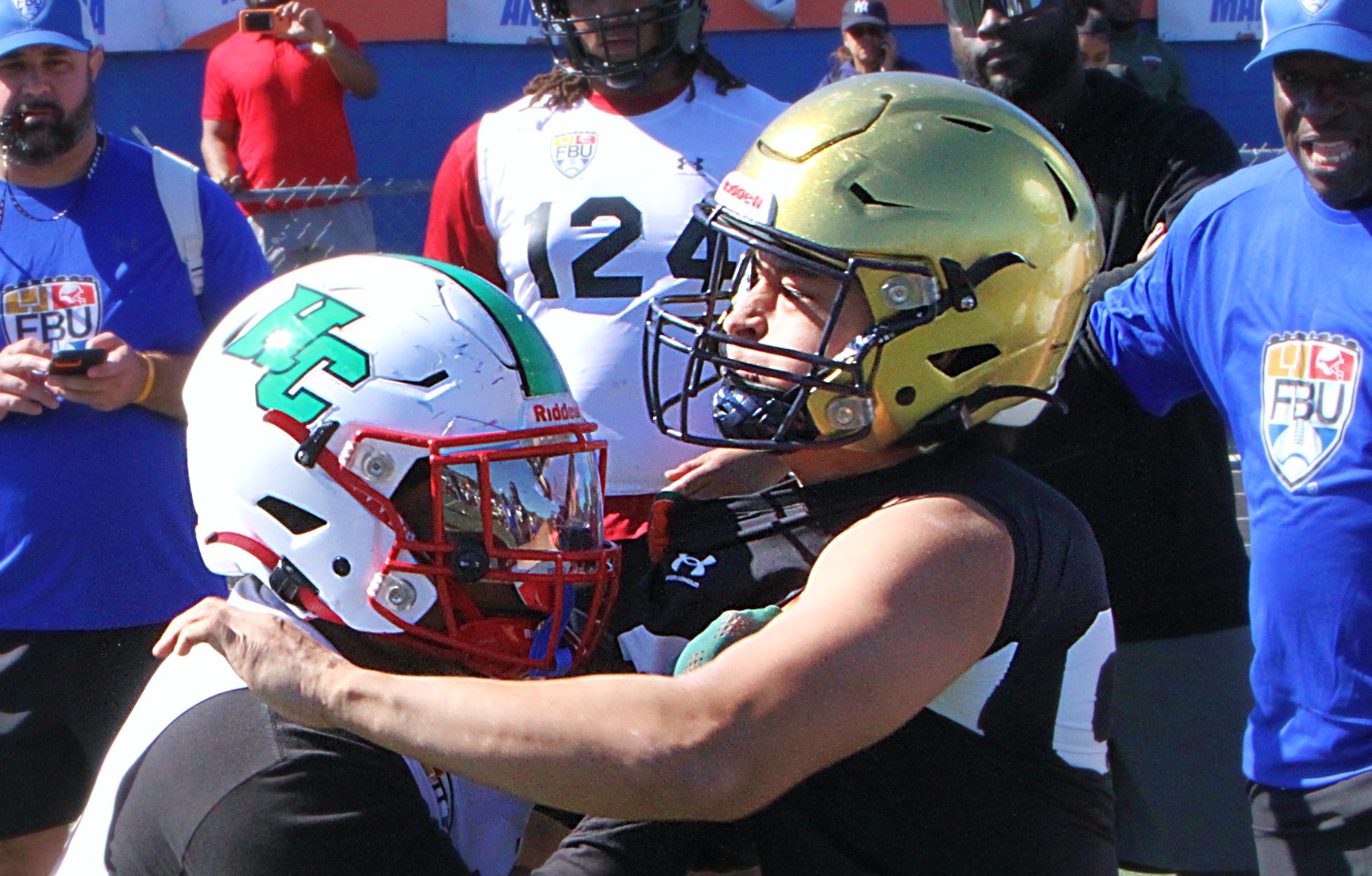 Jhaden Joseph of Auburndale High battles Lukas Zapata of Miami...