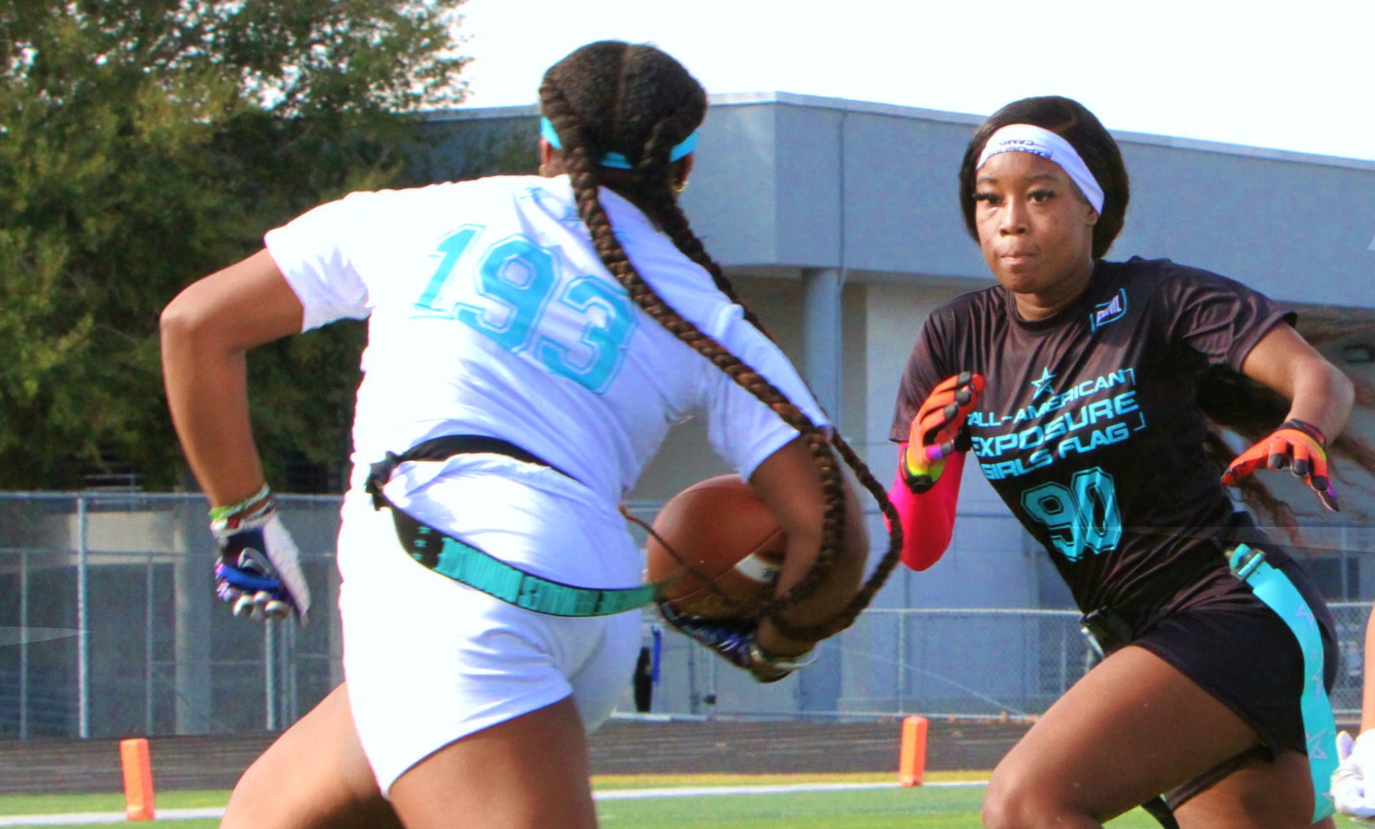 Justice Felton tries to avoid defender Naima Clarke-Harvey at the...