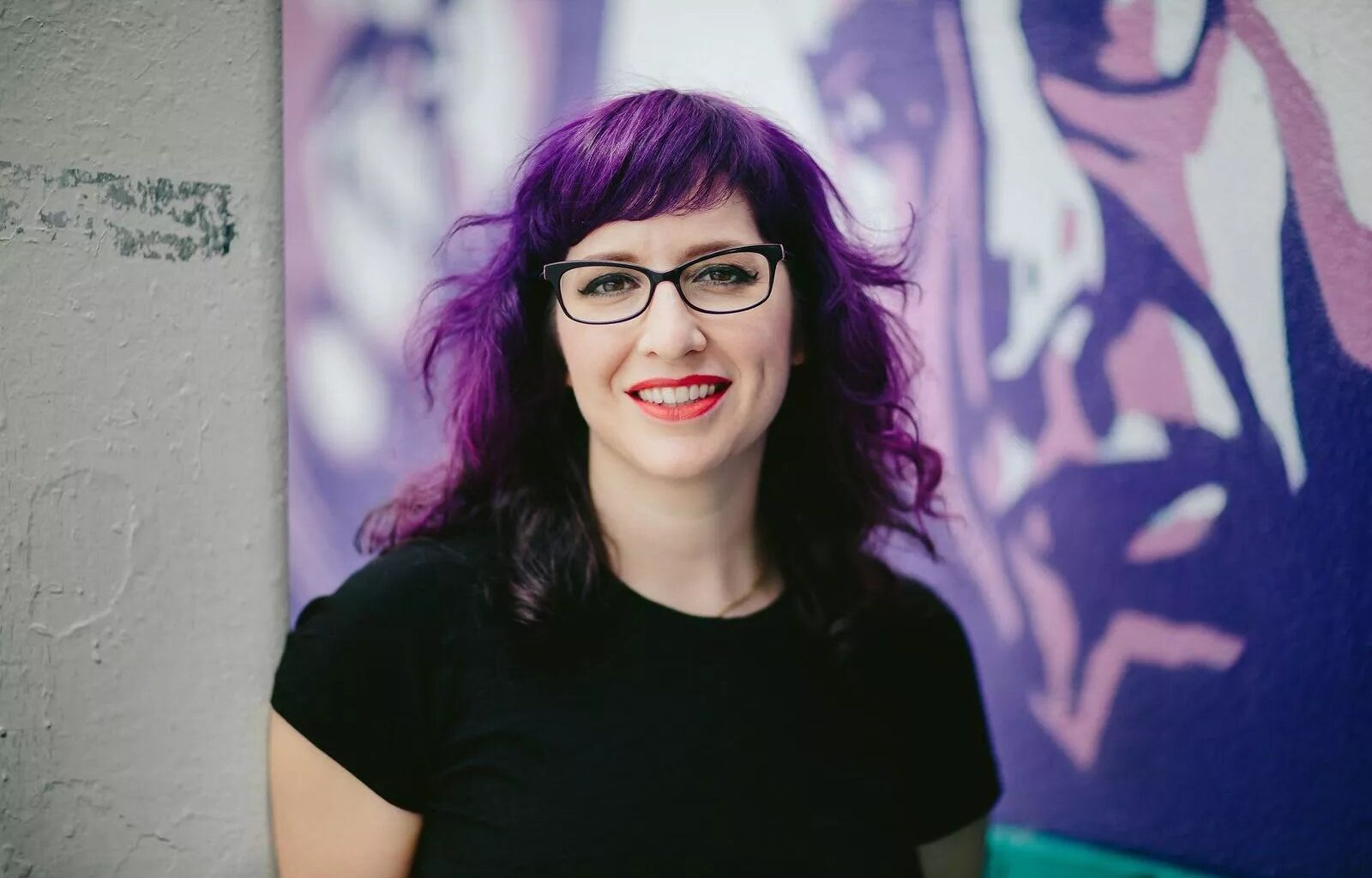 Photo of a purple haired woman