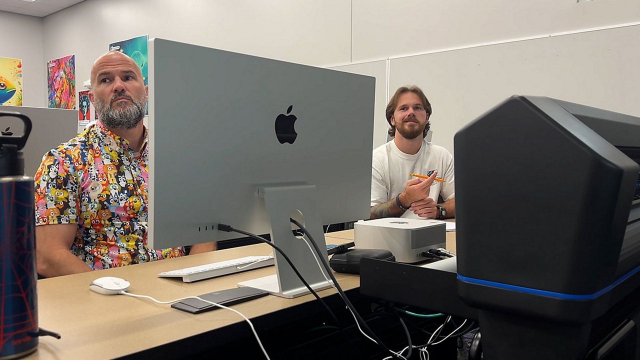 Logan Cappelli (right) in class at St. Pete College. (Spectrum News)