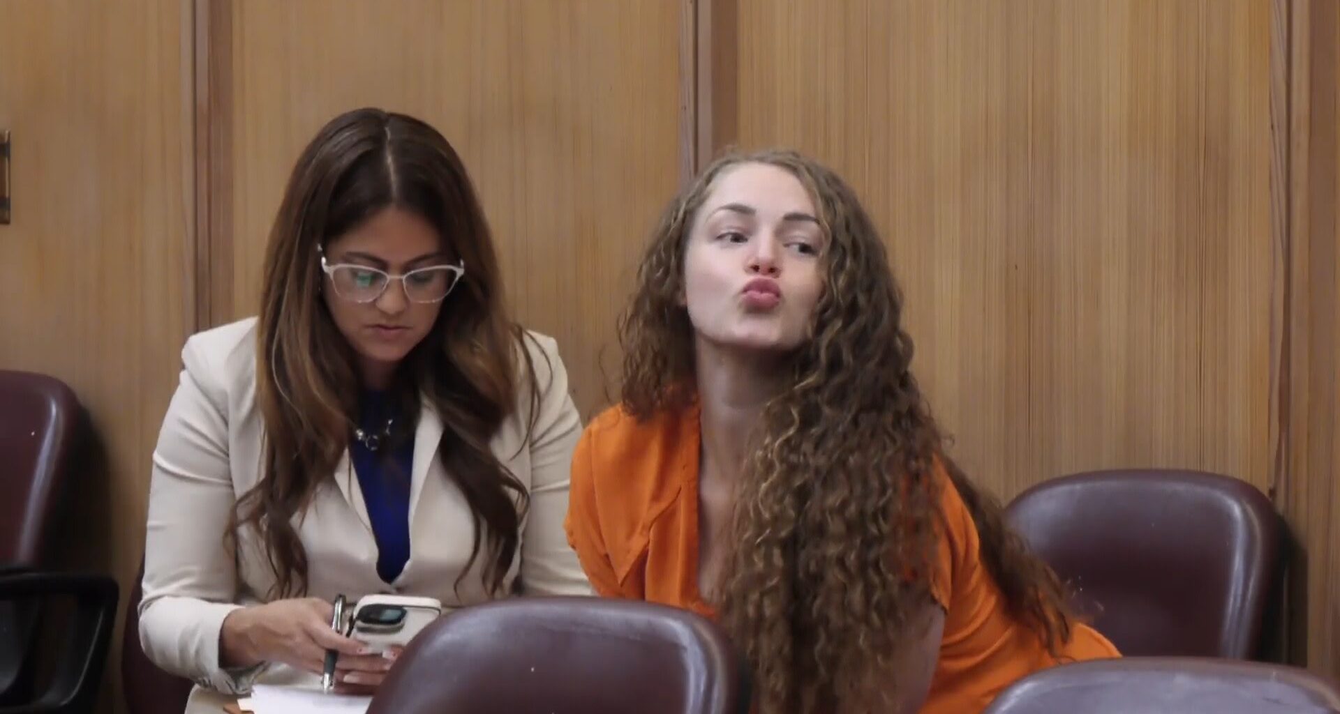 Defendant Courtney Clenney, a Miami OnlyFans model accused of murdering her boyfriend, sits in Miami-Dade Circuit Court Judge Laura Sheron Cruz's courtroom at the Miami-Dade County Courthouse in Miami on Dec. 19, 2024.