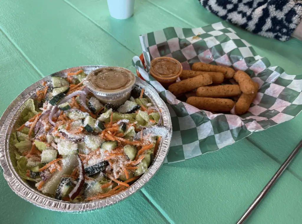 A salad and cheese sticks