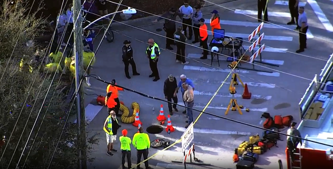 manatee stuck in storm drain