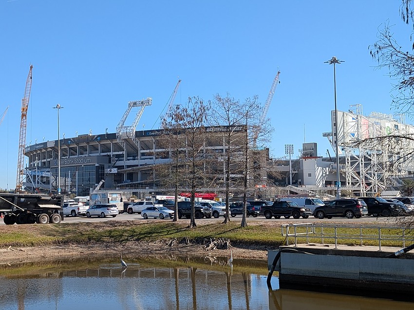 Construction worker vehicles fill parking Lot J at EverBank Stadium on Feb. 24, where work is underway to transform it into the 