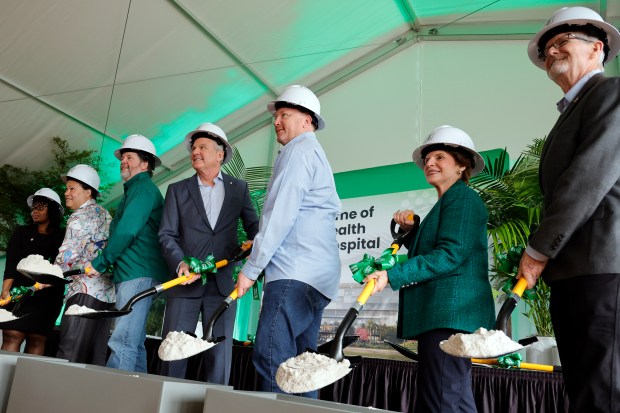 Baptist Health executives and Sunrise City Commissioners pose for photos during a ceremonial groundbreaking ceremony for the new Baptist Health Sunrise Hospital on Wednesday, Jan. 28, 2026. (Amy Beth Bennett / South Florida Sun Sentinel)