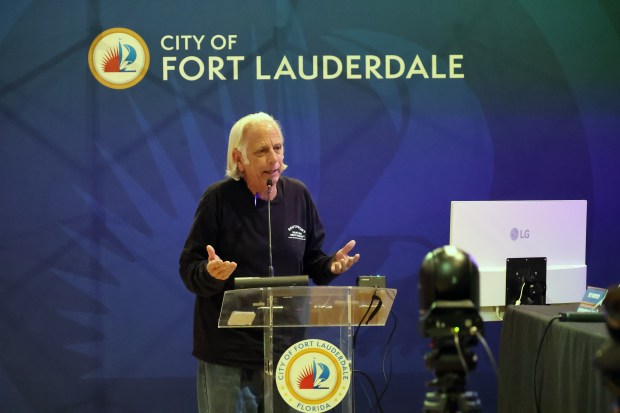 Community activist Ted Inserra urges Fort Lauderdale commissioners to save the trees on Las Olas during a City Hall meeting Tuesday night. "Those trees are part of Fort Lauderdale's DNA," he said. "They are what made Fort Lauderdale. We need to keep those." (Mike Stocker/South Florida Sun Sentinel)