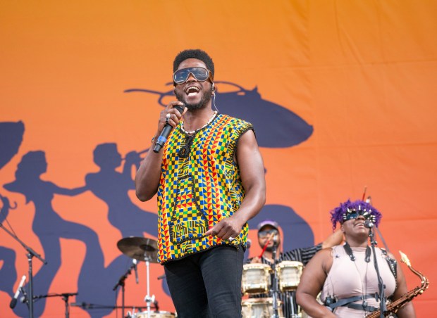 Cimafunk performs during the New Orleans Jazz & Heritage Festival on Thursday, April 25 2024, at the Fair Grounds Race Course in New Orleans. (Amy Harris/Invision/AP)