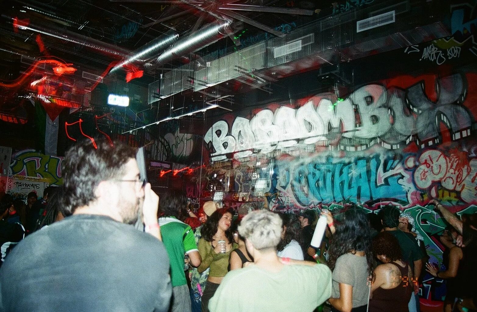 People dancing at a warehouse