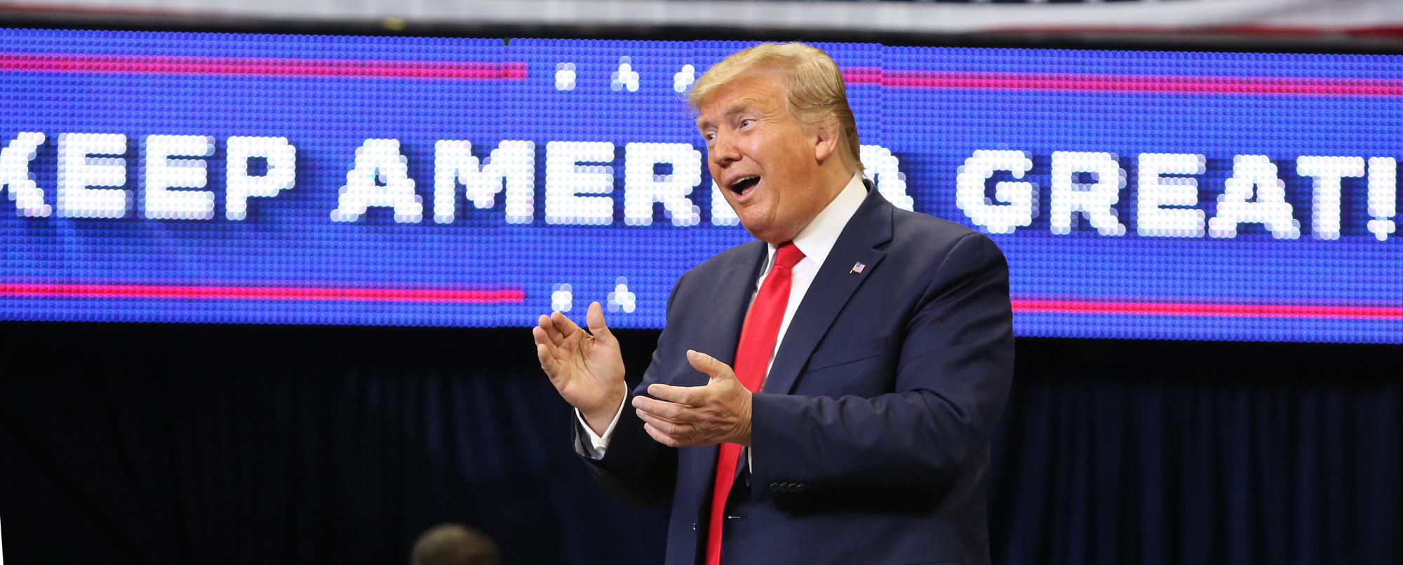 President Donald Trump takes the stage at Amway Center, Tuesday,...