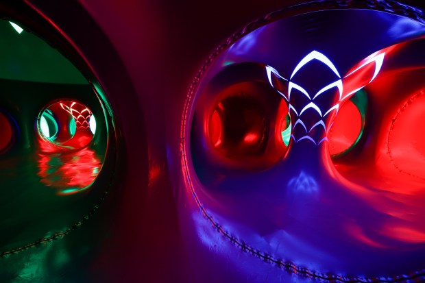 The Architects of Air Arborialis walk-through experience at the Seneff Arts Plaza at the Dr. Phillips Center for the Performing Arts on Friday, 2026. The large, cavernous 17,000-square-foot inflatable structure of fabric and air creates a colorful labyrinth connected by domes and vibrant walkways. It is filled with ephemeral music for an otherworldly experience that guests can explore as part of Immerse 2026. (Rich Pope/Orlando Sentinel)