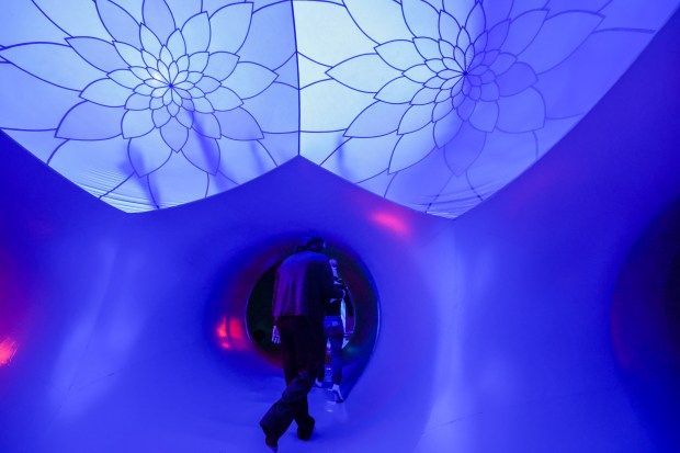 The Architects of Air Arborialis walk-through experience at the Seneff Arts Plaza at the Dr. Phillips Center for the Performing Arts on Friday, 2026. The large, cavernous 17,000-square-foot inflatable structure of fabric and air creates a colorful labyrinth connected by domes and vibrant walkways. It is filled with ephemeral music for an otherworldly experience that guests can explore as part of Immerse 2026. (Rich Pope/Orlando Sentinel)