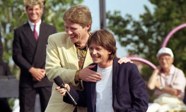 Tom Wilson, who plays "Biff" in the Back to the Future movies, clowns around with Michael J. Fox at the Universal Studios Florida Grand Opening on June 7, 1990. (John Raoux, Orlando Sentinel)