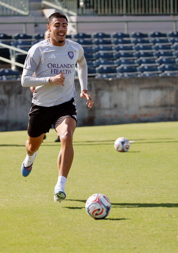 Iago runs during Orlando City Soccer Club team practice at Osceola Heritage Park in Kissimmee on Wednesday. (Ricardo Ramirez Buxeda/ Orlando Sentinel)
