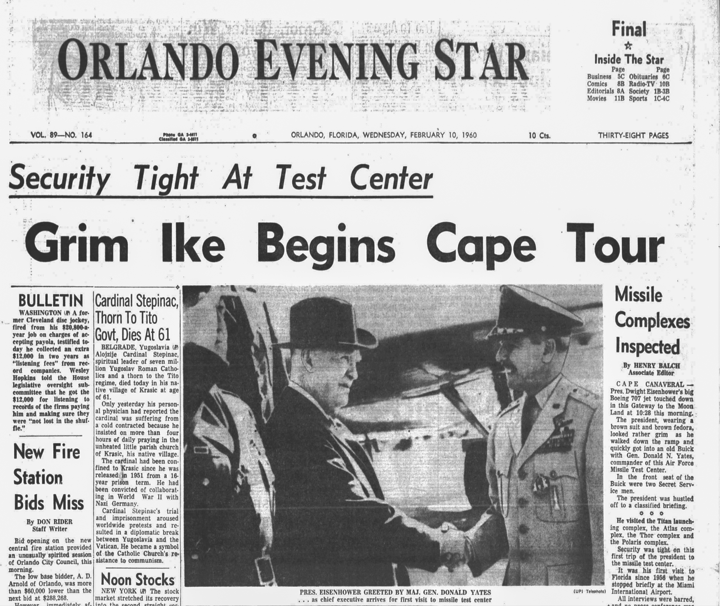 President Dwight Eisenhower is greeted by Maj. Gen. Donald Yates,...