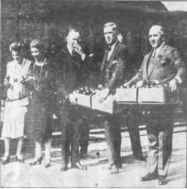 President Calvin Coolidge and his wife sample Central Florida citrus fruit presented to them by the Florida Citrus Growers Clearing House during a stop in Sanford on Feb. 1, 1929. In this photo that appeared on the front page of the Orlando Morning Sentinel are (from left) Mrs. Harry H. Williams of Boston, First Lady Grace Coolidge, President Coolidge, clearing house secretary A.W. Hanley and general manager J. Curtis Robinson. (Sentinel file) 