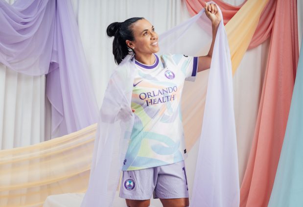 Marta shows the Orlando Pride's new Unity Kit, unveiled on Thursday, Feb. 26, 2026, presented by Orlando Health, the Club's new secondary jersey through the 2027 National Women's Soccer League season. Featuring a vibrant pattern of interlocking ribbons, the Unity Kit honors the strength, togetherness and unbreakable spirit that defined the Orlando community in the aftermath of the Pulse Nightclub tragedy 10years ago. (Orlando Pride)