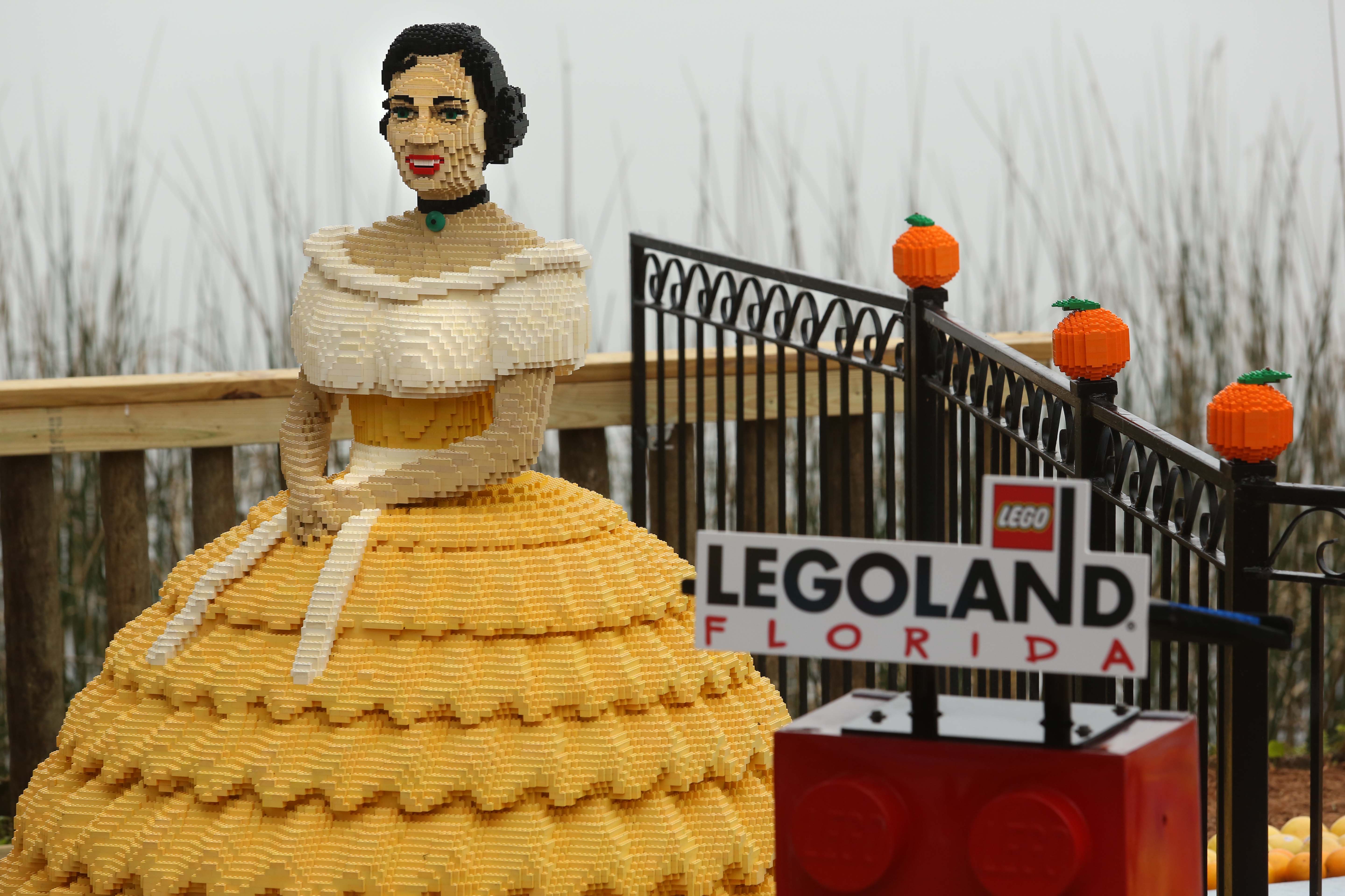 A Lego souther belle stands by the podium. Legoland held...