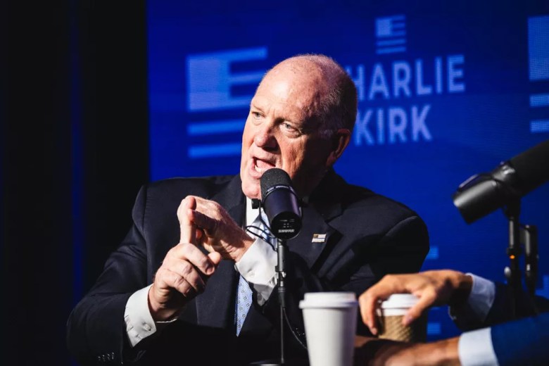 Close-up of Border Czar Tom Homan gesturing while speaking during Turning Point USA in Tampa, florida in July 2025.